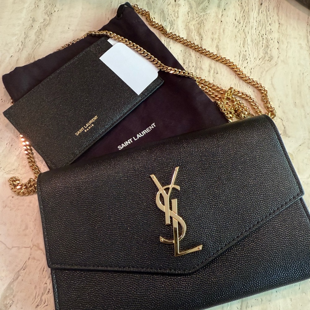Saint Laurent Black and Gold Clutch